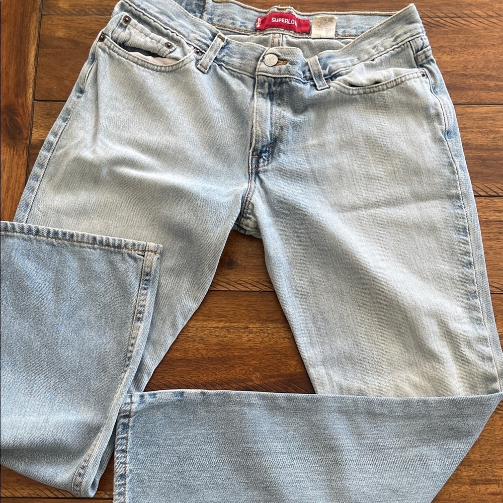 Vintage Levi’s 518 superlow light wash boot cut  denim jeans ( 30 x 28 ) USA